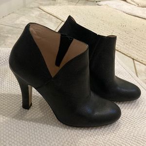 Size 37 (7) black Italian leather booties. Small nick in right heel.